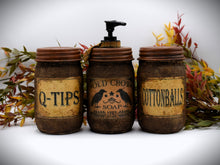 Load image into Gallery viewer, Set of Three Primitive Themed Bathroom Set, Old Crow Hand Soap Dispenser, Q-Tips Jar, Cottonballs Jar, Grungy Style Primitive Bathroom Decor